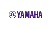 The image shows the Yamaha logo with a purple tuning fork symbol inside a circle, followed by the word “YAMAHA” in bold purple capital letters on a light gray background.